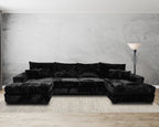 modern black corduroy sectional sofa with chaise in living room on striped rug