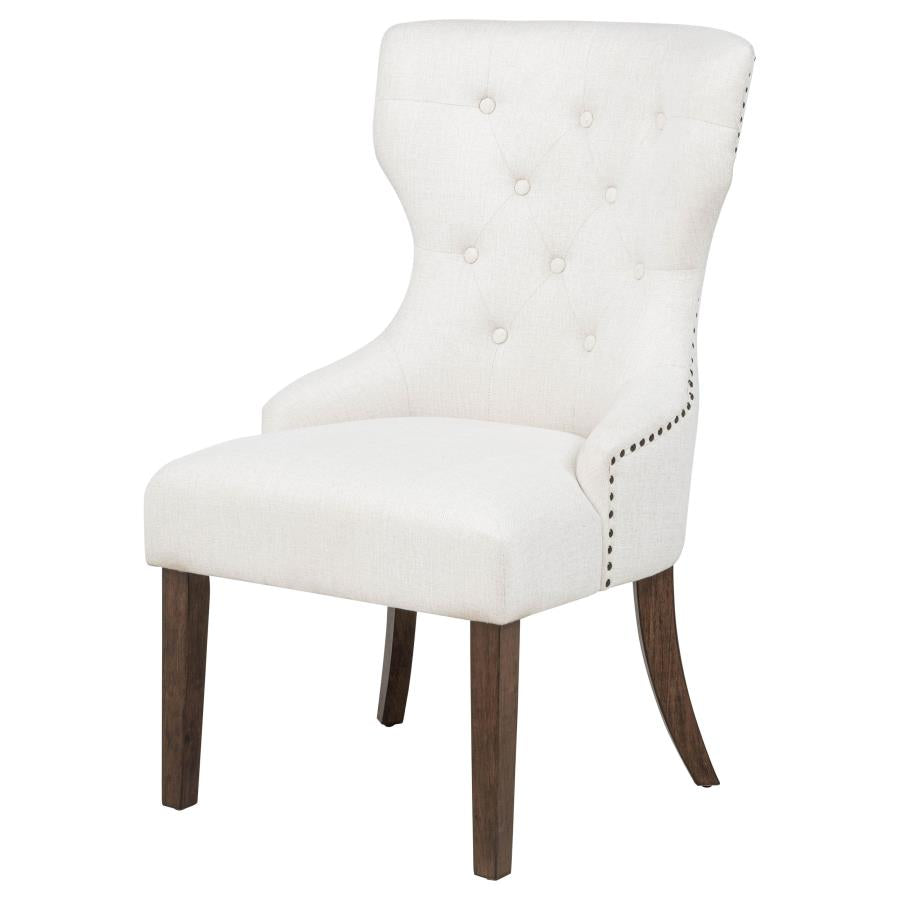 modern ivory upholstered accent chair with tufted back and dark wood legs for living room or bedroom