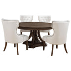 round dark wood dining table with four cream upholstered chairs, traditional style
