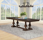 large dark wood dining table with turned legs, traditional style, in bright dining room setting