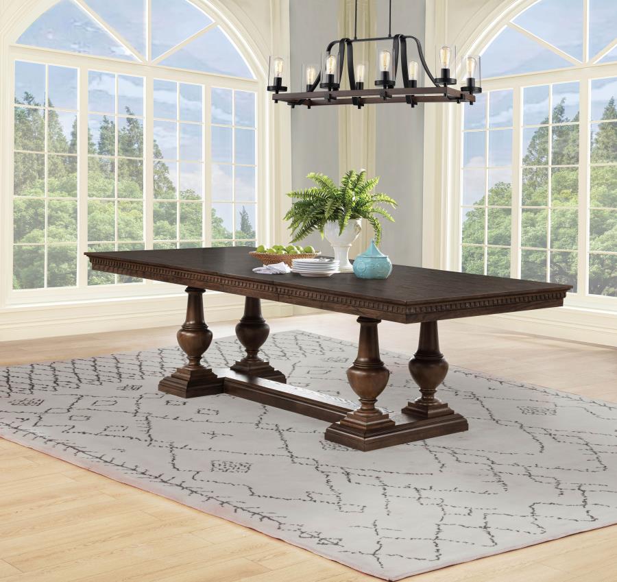large dark wood dining table with turned legs, traditional style, in bright dining room setting