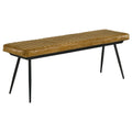 Antique camel leather dining bench with channel stitching and black tapered metal legs on white background.