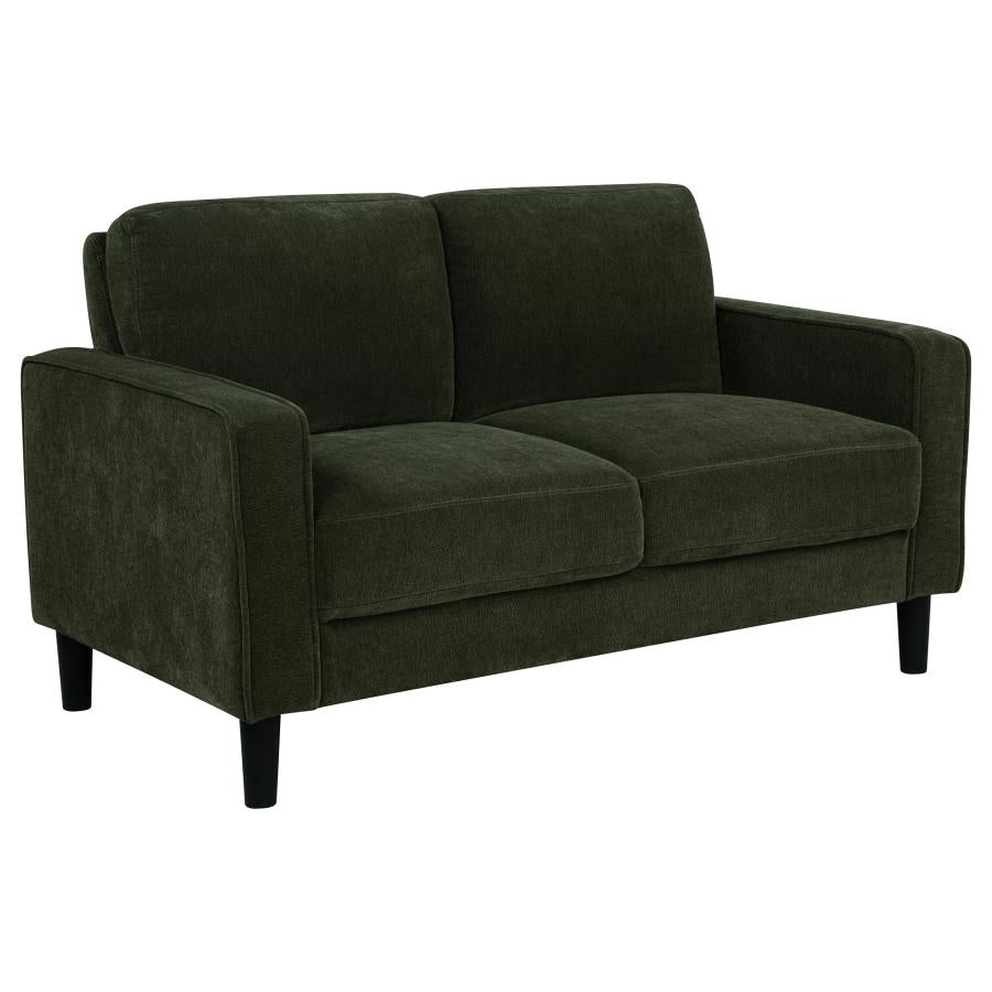 Matcha green fabric loveseat with track arms, two cushions, and black tapered legs on white background.