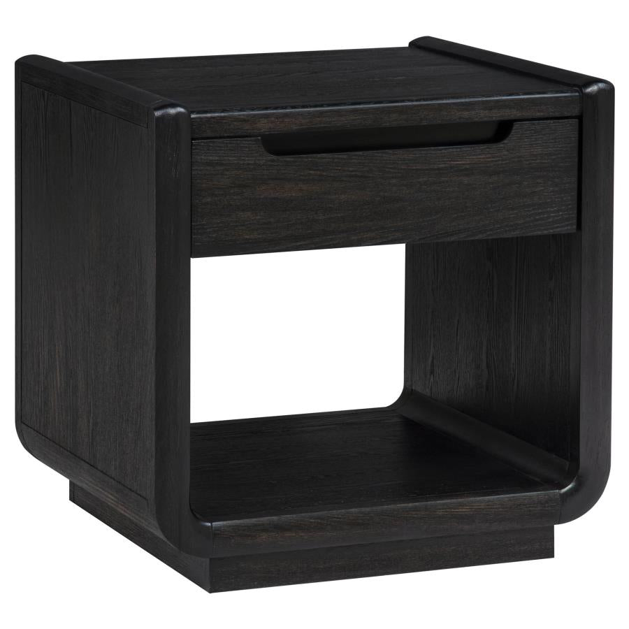 Burnished black wood end table with single drawer and open shelf storage compartment below.