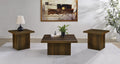 Dark pine 3-piece table set with square coffee table and two cube end tables on white rug in modern living room.