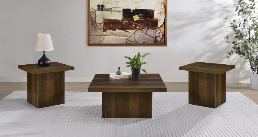 Dark pine 3-piece table set with square coffee table and two cube end tables on white rug in modern living room.