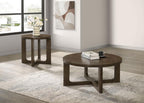 Two round brown wood coffee tables with sculptural open bases displayed on a light area rug in a minimalist living room.