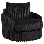 Black corduroy swivel accent armchair with ribbed upholstery and rounded silhouette