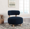 Zonie Boucle Upholstered Barrel Back Accent Chair Blue - Home & Sleep Outlet