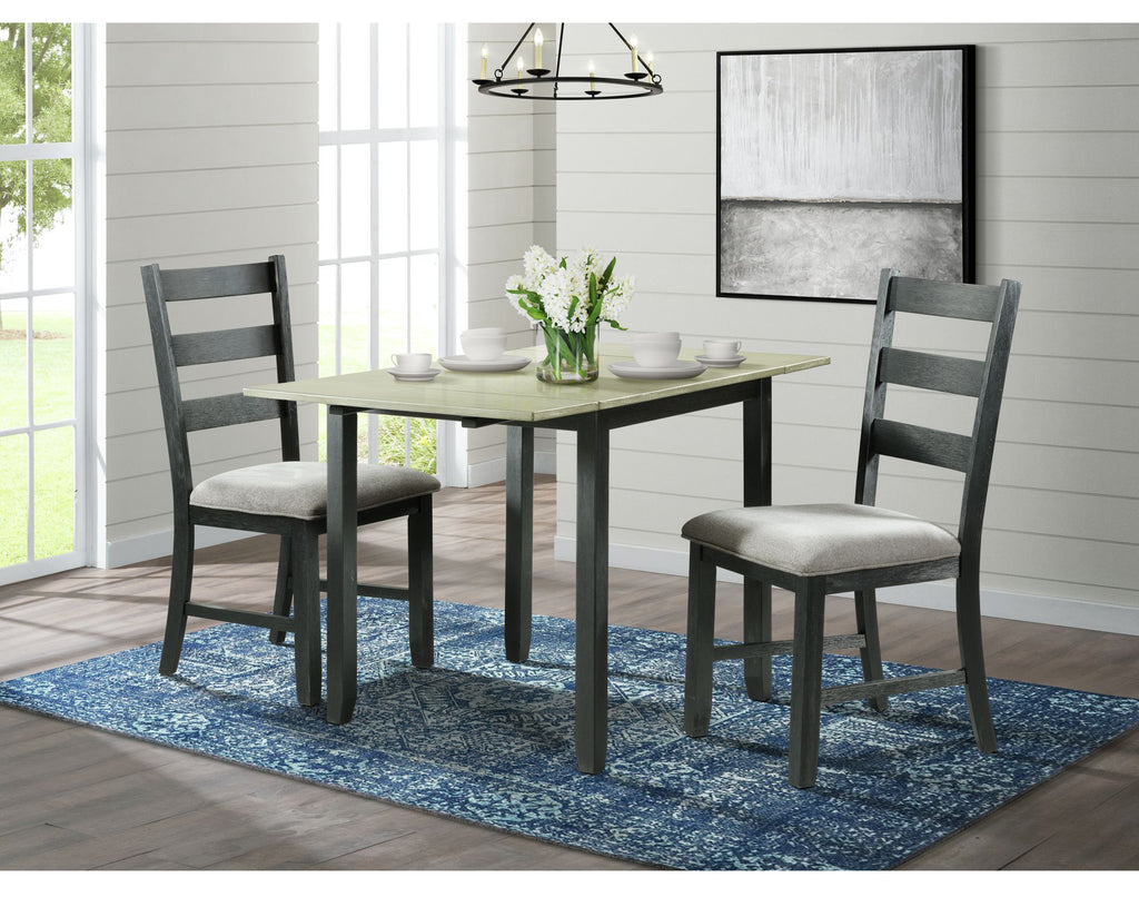 Modern black drop leaf dining table with two cushioned chairs on blue rug in bright dining room